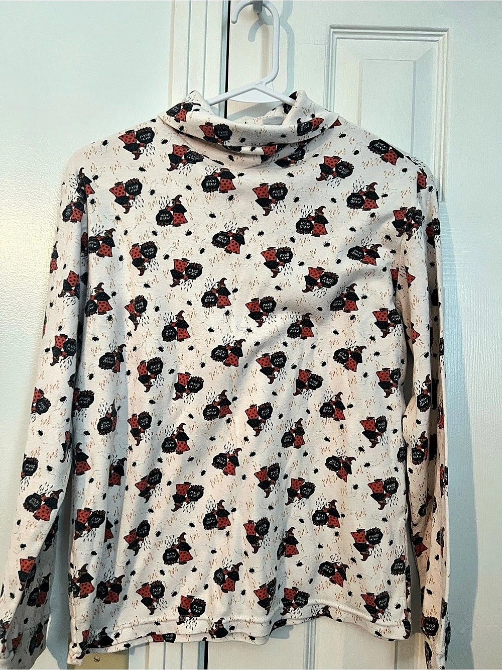 GirlsLong Sleeve Turtleneck Halloween/ Trick or Treat Print Top in White & Blac